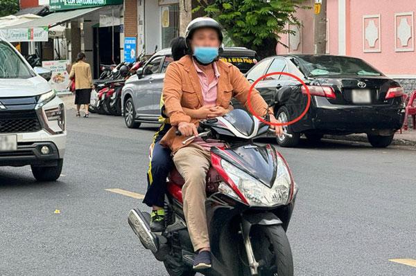 Đi xe máy một gương bị xử phạt nhu thế nào?
